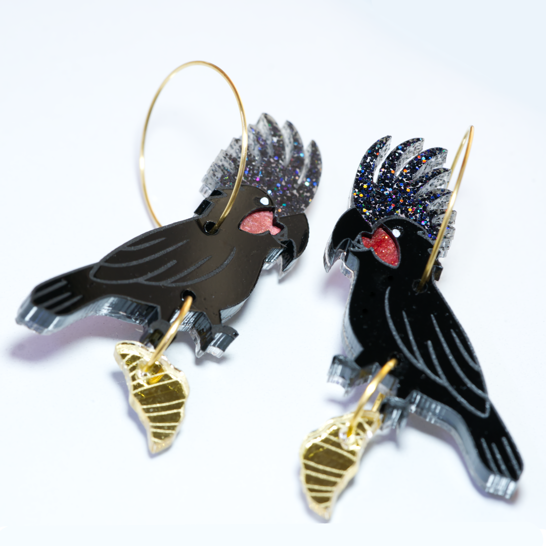 Palm cockatoo and croissant earrings