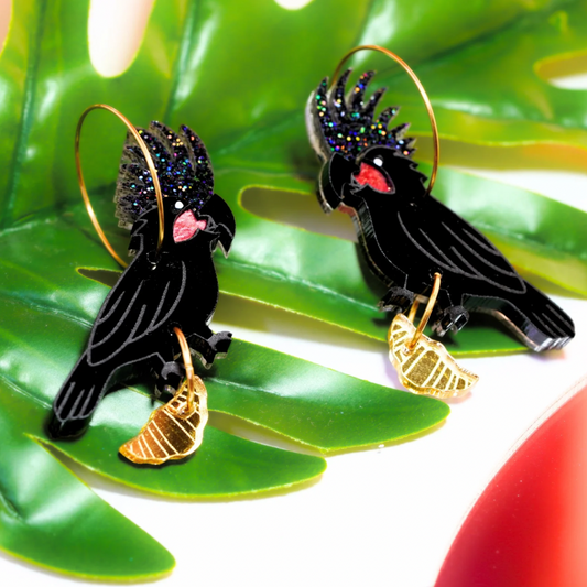 Palm cockatoo and croissant earrings