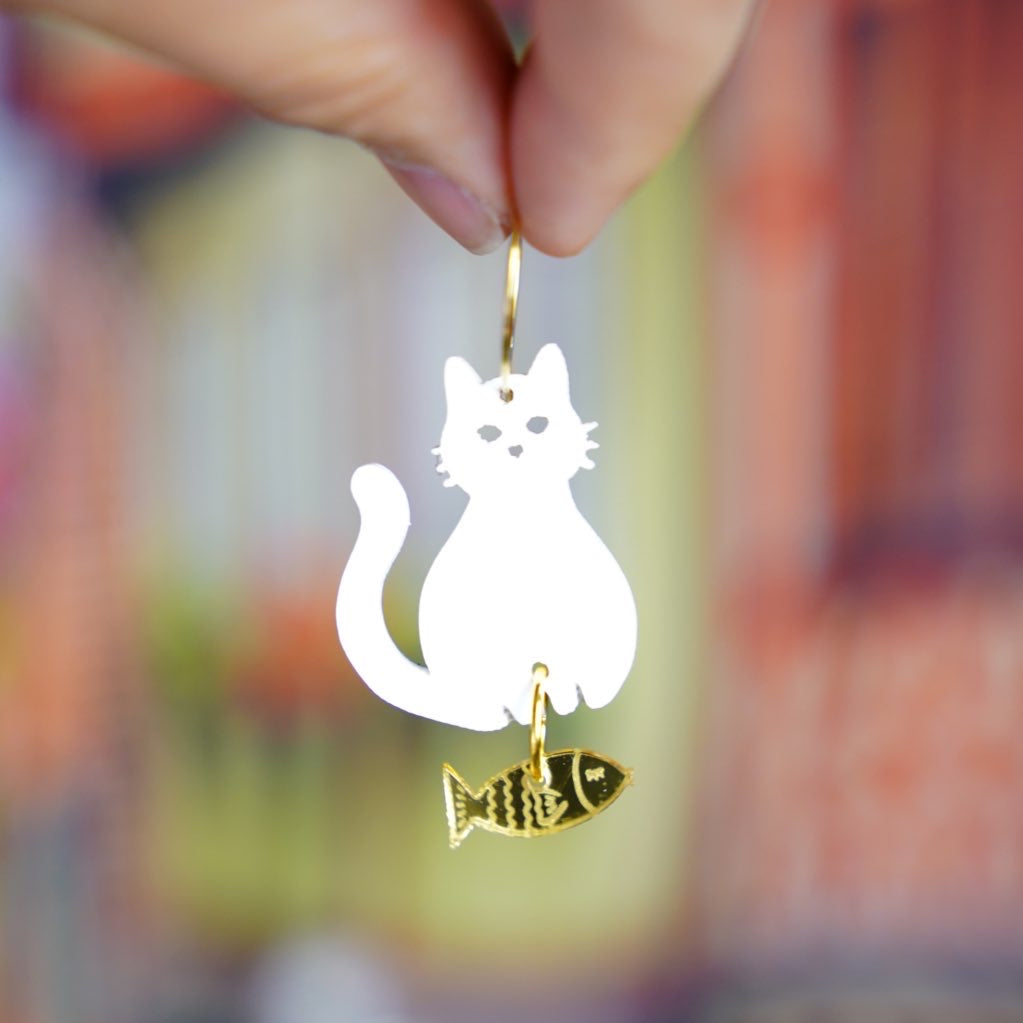 Acrylic white cat and gold fish earrings