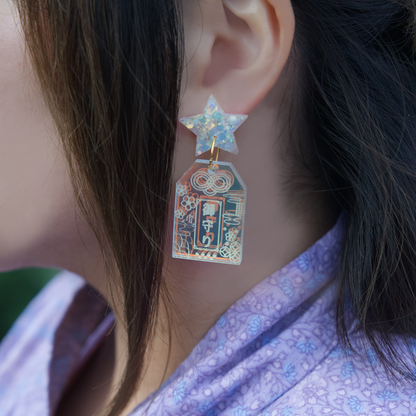 Handmade Hoshi no Omamori earrings inspired by Japanese good luck charms, made from iridescent acrylic and glitter resin in Melbourne
