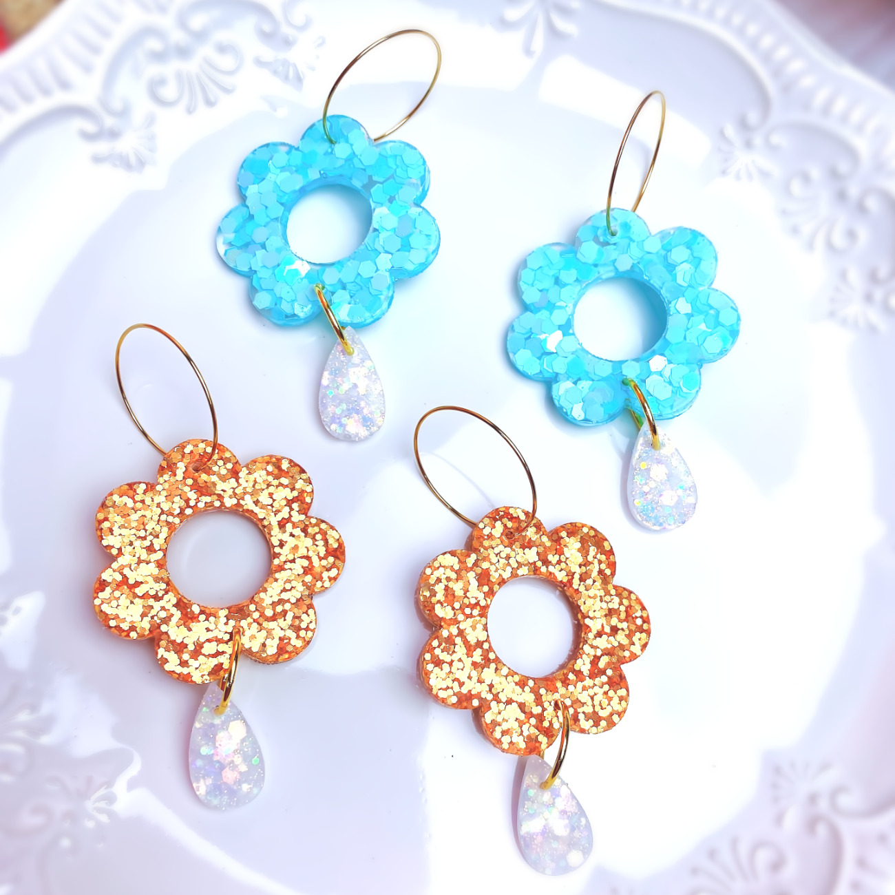 Resin flower drop earrings shell blue