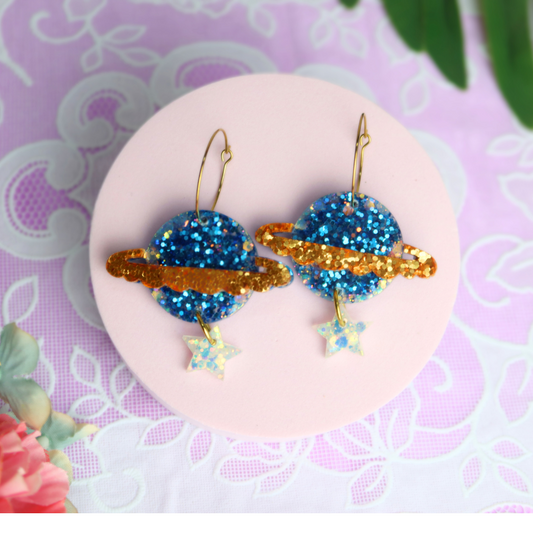 Resin glitter planet earrings blue