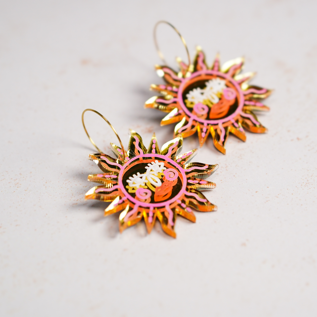 Gold mirror Ancient sun earrings