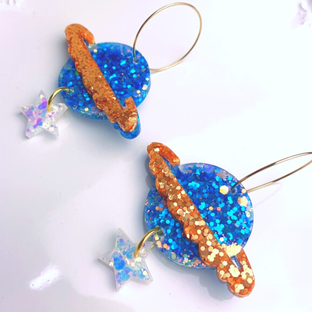 Resin glitter planet earrings blue